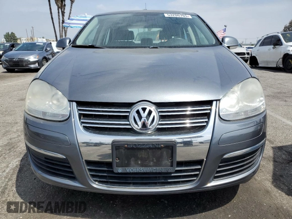 2007 Volkswagen Jetta Wolfsburg Edition z VIN 3VWEG71K07M125028, wystawiony jako Copart lot #53206765 z przebiegiem 53 735 mil mil oraz Czysty tytuł • Clean title. Historia ofert i sprzedaży dostępna na DreamBid. Obrazek 5.