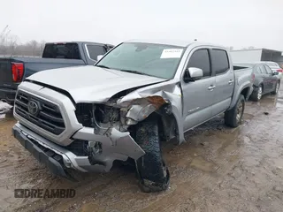 2018 Toyota Tacoma SR with VIN 3TMCZ5AN4JM148581, listed as a IAAI auction lot 41462945 with 115,655 mi miles. Bid and sale history available at carsss.com. Image 17.