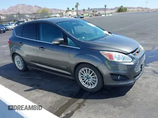 2016 Ford C-Max Energi SEL with VIN 1FADP5CU5GL112686, listed as a IAAI auction lot 42009055 with 146,300 mi miles. Bid and sale history available at carsss.com. Image 1.