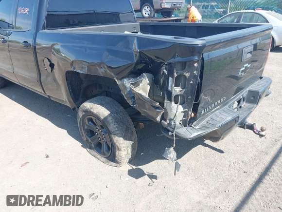 2017 Chevrolet Silverado 1500 LT with VIN 1GCVKREC6HZ271160, listed as a IAAI auction lot 42162389 with 103,992 mi miles and . Bid and sale history available at DreamBid. Image 6.