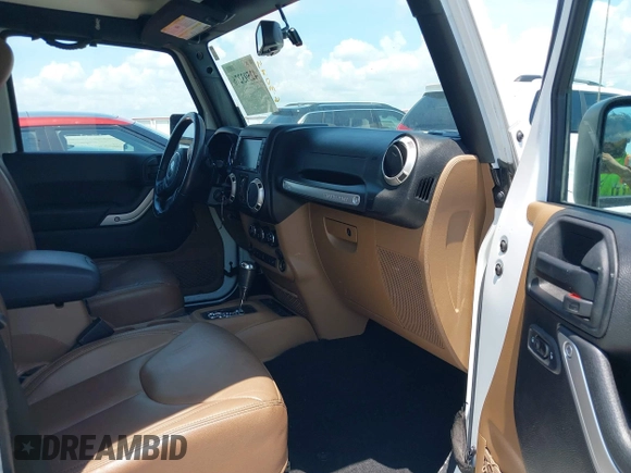 2018 Jeep Wrangler Unlimited Sahara with VIN 1C4BJWEG3JL805263, listed as a IAAI auction lot 42593276 with 96,489 mi miles and . Bid and sale history available at DreamBid. Image 5.