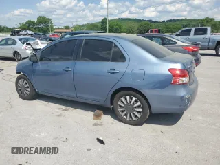 2009 Toyota Yaris with VIN JTDBT903191331207, listed as a Copart auction lot 54570165 with 232,601 mi miles and Salvage Title. Bid and sale history available at DreamBid. Image 2.