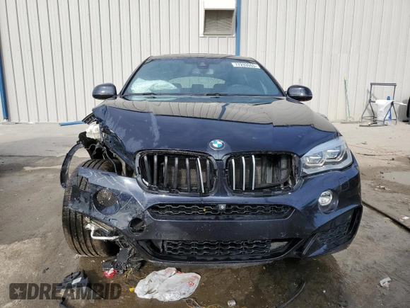 2015 BMW X6 xDrive50i with VIN 5UXKU6C56F0F93641, listed as a Copart auction lot 77233553 with 71,409 mi miles. Bid and sale history available at carsss.com. Image 5.