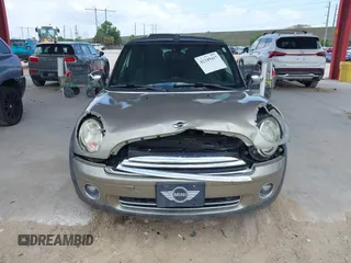 2010 MINI Convertible with VIN WMWMR3C52ATU97825, listed as a IAAI auction lot 42349417 with 64,045 mi miles and . Bid and sale history available at DreamBid. Image 12.