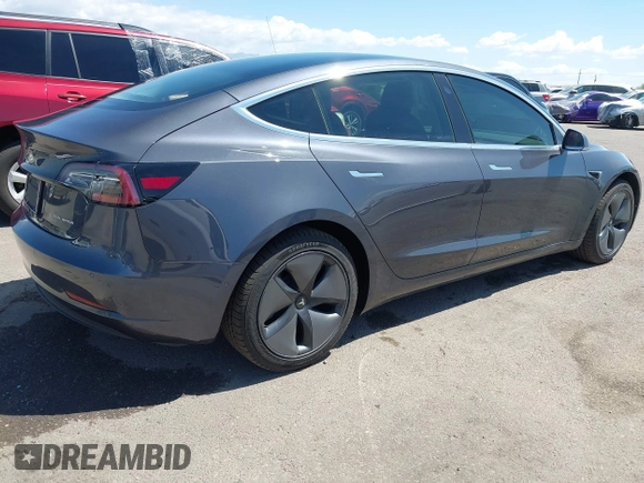 2019 Tesla Model 3 Long Range with VIN 5YJ3E1EB9KF386047, listed as a IAAI auction lot 42215362 with 41,246 mi miles and . Bid and sale history available at DreamBid. Image 4.