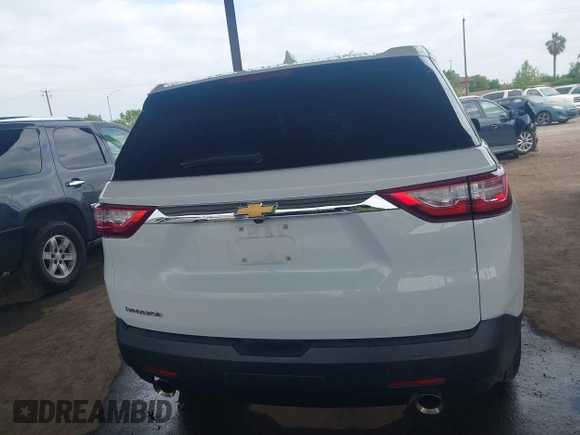 2021 Chevrolet Traverse LS z VIN 1GNERFKW5MJ197111, wystawiony jako IAAI lot #42056277 z przebiegiem 64 771 mil mil oraz . Historia ofert i sprzedaży dostępna na DreamBid. Obrazek 16.