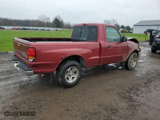 1999 Mazda B-Series 2WD Truck SX with VIN 4F4YR12C2XTM08473, listed as a Copart auction lot 52577185 with 173,620 mi miles and Salvage Title. Bid and sale history available at carsss.com. Image 3.