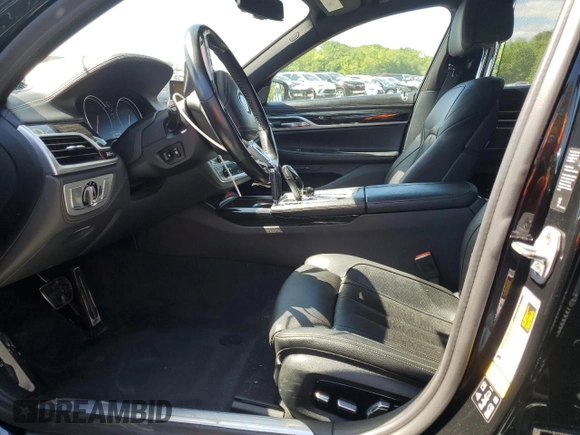 2019 BMW 7 Series 740i xDrive z VIN WBA7E4C52KGV28841, wystawiony jako Copart lot #56567375 z przebiegiem 162 220 mil mil oraz Szkoda całkowita • Salvage title. Historia ofert i sprzedaży dostępna na DreamBid. Obrazek 7.
