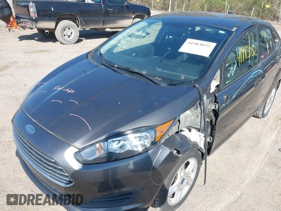 2017 Ford Fiesta SE with VIN 3FADP4BJ0HM117117, listed as a IAAI auction lot 41983052 with 99,186 mi miles. Bid and sale history available at carsss.com. Image 6.