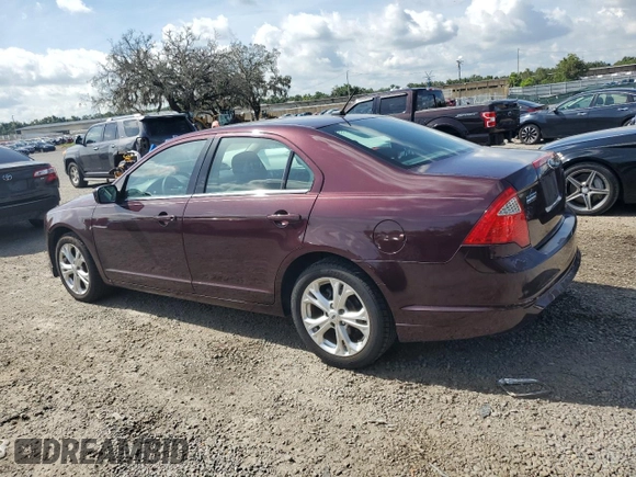 2012 Ford Fusion SE with VIN 3FAHP0HA0CR291458, listed as a Copart auction lot 63357165 with 122,992 mi miles and Salvage title. Bid and sale history available at DreamBid. Image 2.
