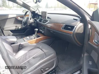 2014 Audi A7 Premium Plus z VIN WAUWGAFC4EN160144, wystawiony jako IAAI lot #41970181 z przebiegiem 118 761 mil mil oraz . Historia ofert i sprzedaży dostępna na DreamBid. Obrazek 5.