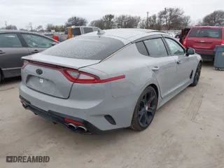 2018 Kia Stinger GT2 with VIN KNAE55LC6J6015897, listed as a IAAI auction lot 41334513 with 126,349 mi miles. Bid and sale history available at carsss.com. Image 4.