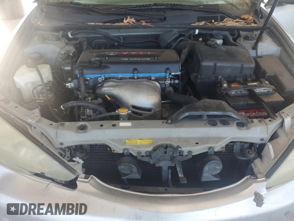 2005 Toyota Camry STD z VIN 4T1BE32K35U598719, wystawiony jako Copart lot #84796804 z przebiegiem 148 683 mil mil oraz Szkoda całkowita • Salvage title. Historia ofert i sprzedaży dostępna na DreamBid. Obrazek 11.