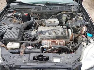 1997 Honda Civic EX with VIN 1HGEJ8242VL044722, listed as a IAAI auction lot 42045941 with 266,481 mi miles. Bid and sale history available at carsss.com. Image 10.