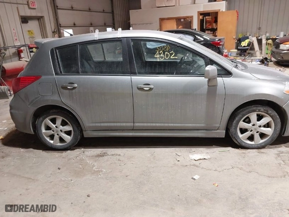2011 Nissan Versa 1.8 S with VIN 3N1BC1CP0BL403242, listed as a IAAI auction lot 41564302 with 146,767 mi miles. Bid and sale history available at carsss.com. Image 13.