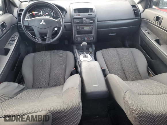 2007 Mitsubishi Galant DE z VIN 4A3AB26F27E034179, wystawiony jako Copart lot #88202485 z przebiegiem 197 830 mil mil oraz Szkody całkowita. Historia ofert i sprzedaży dostępna na DreamBid. Obrazek 8.