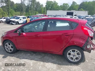 2016 Ford Fiesta SE z VIN 3FADP4EJ4GM178707, wystawiony jako IAAI lot #42095480 z przebiegiem 96 454 mil mil oraz . Historia ofert i sprzedaży dostępna na DreamBid. Obrazek 14.