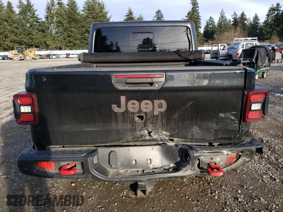 2021 Jeep Gladiator Rubicon with VIN 1C6JJTBG5ML500423, listed as a Copart auction lot 46954765 with 82,483 mi miles and Salvage title. Bid and sale history available at DreamBid. Image 6.