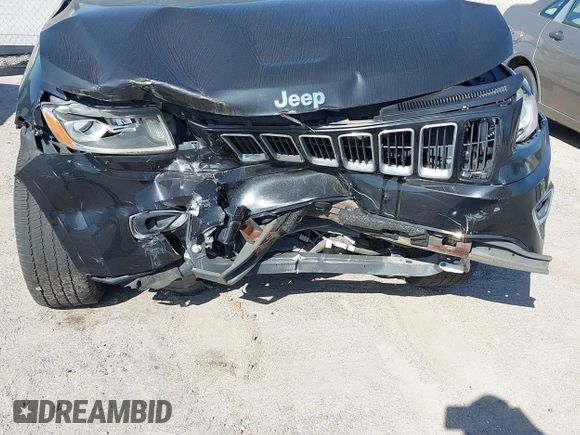 2014 Jeep Grand Cherokee Laredo with VIN 1C4RJEAG7EC263590, listed as a IAAI auction lot 41699106 with 136,581 mi miles and . Bid and sale history available at DreamBid. Image 6.