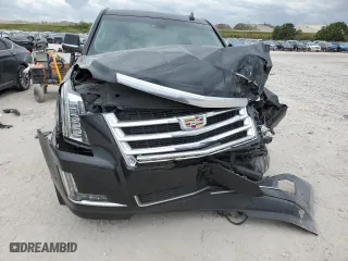 2020 Cadillac Escalade Premium Luxury with VIN 1GYS3CKJ6LR130642, listed as a Copart auction lot 48387515 with 74,707 mi miles and Salvage Title. Bid and sale history available at carsss.com. Image 5.