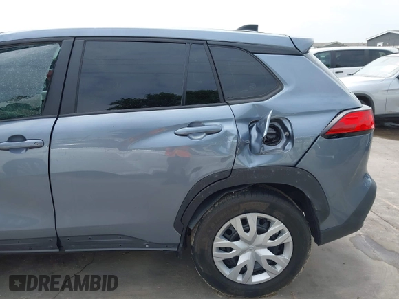 2023 Toyota Corolla Cross L with VIN 7MUAAAAG9PV047205, listed as a IAAI auction lot 41898077 with 29,184 mi miles and . Bid and sale history available at DreamBid. Image 13.