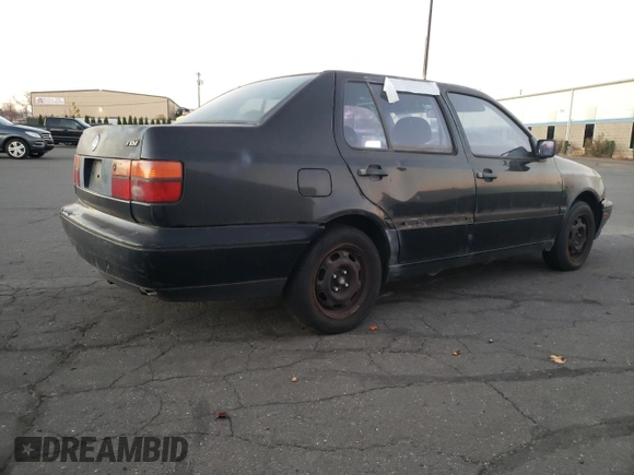 1998 Volkswagen Jetta TDI z VIN 3VWRF81H7WM228525, wystawiony jako Copart lot #65629323 z przebiegiem Nie podano mil oraz Szkoda całkowita • Salvage title. Historia ofert i sprzedaży dostępna na DreamBid. Obrazek 3.