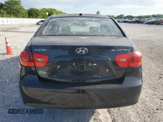 2009 Hyundai Elantra SE z VIN KMHDU46D39U608524, wystawiony jako Copart lot #57435405 z przebiegiem 216 619 mil mil oraz Szkoda całkowita • Salvage title. Historia ofert i sprzedaży dostępna na DreamBid. Obrazek 6.