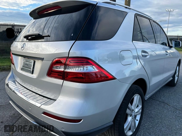 2014 Mercedes-Benz M 350 with VIN 4JGDA5JB3EA372327, listed as a Copart auction lot 63948025 with 71,418 mi miles and Clean title. Bid and sale history available at DreamBid. Image 4.