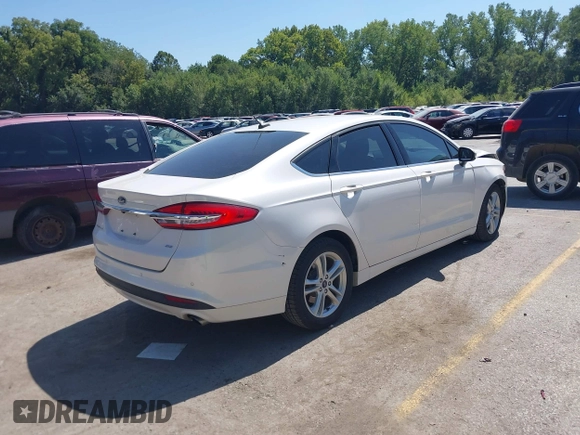 2018 Ford Fusion SE with VIN 3FA6P0H71JR115009, listed as a IAAI auction lot 40270894 with 54,508 mi miles. Bid and sale history available at carsss.com. Image 4.
