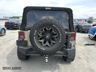 2017 Jeep Wrangler Unlimited Sport with VIN 1C4BJWDG5HL670282, listed as a Copart auction lot 52332905 with 106,022 mi miles and Salvage Title. Bid and sale history available at carsss.com. Image 6.