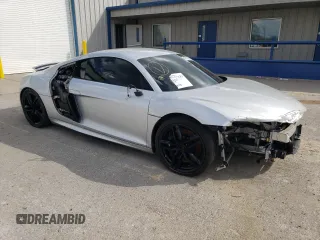 2012 Audi R8 V10 with VIN WUAENAFG0CN000740, listed as a Copart auction lot 47002395 with 60,873 mi miles and Salvage Title. Bid and sale history available at DreamBid. Image 4.