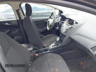 2017 Ford Focus SE with VIN 1FADP3F23HL232809, listed as a IAAI auction lot 42117700 with 104,802 mi miles and . Bid and sale history available at DreamBid. Image 5.