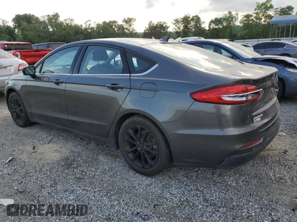2020 Ford Fusion SE with VIN 3FA6P0HD0LR184251, listed as a Copart auction lot 57325205 with 99,142 mi miles and Salvage title. Bid and sale history available at DreamBid. Image 2.
