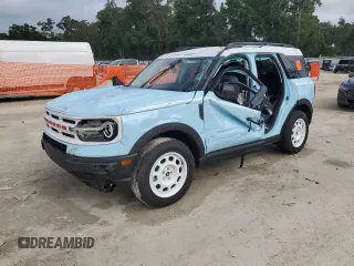2024 Ford Bronco Sport Heritage z VIN 3FMCR9G65RRE09251, wystawiony jako Copart lot #63491285 z przebiegiem 2 315 mil mil oraz Nie do naprawy • Non repairable. Historia ofert i sprzedaży dostępna na DreamBid. Obrazek 1.
