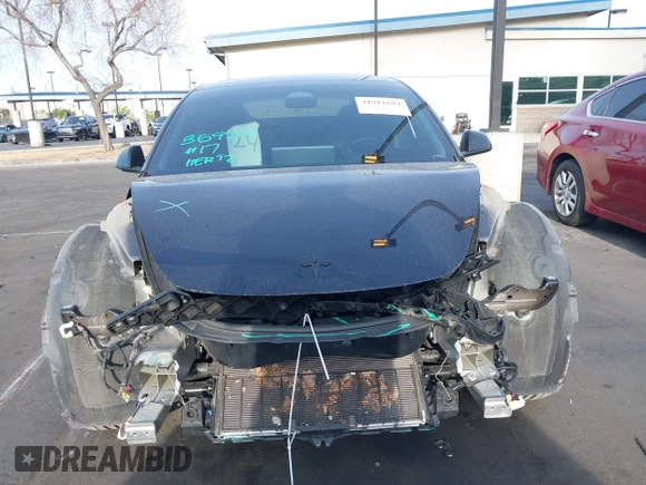 2023 Tesla Model 3 Performance z VIN 5YJ3E1EC3PF716085, wystawiony jako IAAI lot #41911684 z przebiegiem 45 184 mil mil oraz . Historia ofert i sprzedaży dostępna na DreamBid. Obrazek 13.