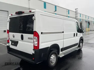 2023 Ram ProMaster Cargo with VIN 3C6LRVVG7PE572634, listed as a Copart auction lot 50415055 with 17,990 mi miles and Clean Title. Bid and sale history available at DreamBid. Image 4.