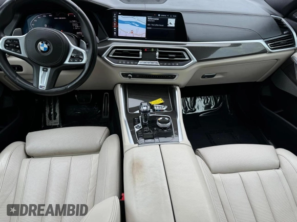 2021 BMW X6 M50i z VIN 5UXCY8C02M9D95172, wystawiony jako Copart lot #84796854 z przebiegiem 75 299 mil mil oraz Czysty tytuł • Clean title. Historia ofert i sprzedaży dostępna na DreamBid. Obrazek 7.