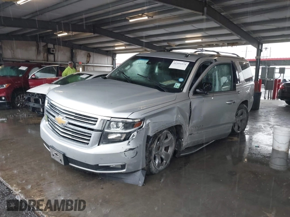 2015 Chevrolet Tahoe LTZ with VIN 1GNSCCKC5FR123099, listed as a IAAI auction lot 41391974 with Not provided miles and . Bid and sale history available at DreamBid. Image 6.