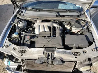 2005 Jaguar X-Type 3.0L with VIN SAJWA51C55WE31701, listed as a Copart auction lot 82908594 with 186,332 mi miles and Salvage Title. Bid and sale history available at carsss.com. Image 11.