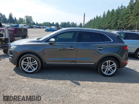 2019 Lincoln MKC Reserve with VIN 5LMTJ3DH8KUL13426, listed as a IAAI auction lot 42565566 with 60,392 mi miles and . Bid and sale history available at DreamBid. Image 14.