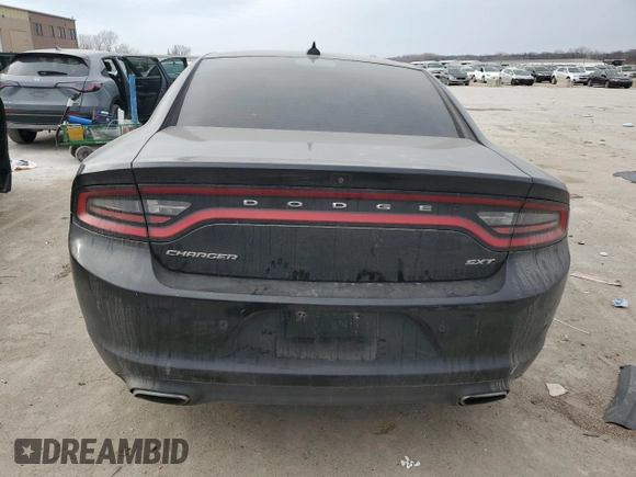 2015 Dodge Charger SXT z VIN 2C3CDXHG4FH844496, wystawiony jako Copart lot #86100084 z przebiegiem 110 090 mil mil oraz Szkoda całkowita • Salvage title. Historia ofert i sprzedaży dostępna na DreamBid. Obrazek 6.