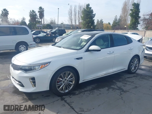 2016 Kia Optima SXL Turbo with VIN 5XXGV4L20GG074869, listed as a IAAI auction lot 41212808 with 82,884 mi miles. Bid and sale history available at carsss.com. Image 19.