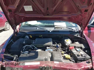 2003 Dodge Dakota SLT with VIN 1D7HG42N33S369870, listed as a IAAI auction lot 41826771 with 214,840 mi miles. Bid and sale history available at carsss.com. Image 10.
