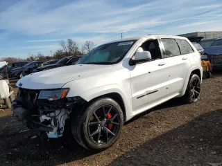 2021 Jeep Grand Cherokee SRT with VIN 1C4RJFDJ0MC548983, listed as a Copart auction lot 84048824 with 45,247 mi miles and Salvage Title. Bid and sale history available at carsss.com. Image 1.