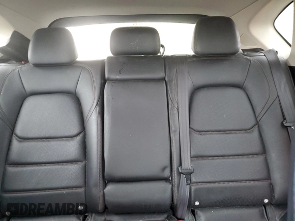 2019 Mazda CX-5 Grand Touring with VIN JM3KFBDM4K0669589, listed as a Copart auction lot 54948455 with 64,475 mi miles and Salvage Title. Bid and sale history available at carsss.com. Image 10.