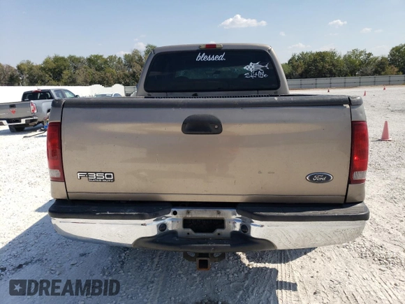 2002 Ford F-350 XL with VIN 3FTSW31F62MA15436, listed as a Copart auction lot 75384314 with 284,637 mi miles and Salvage Title. Bid and sale history available at DreamBid. Image 6.