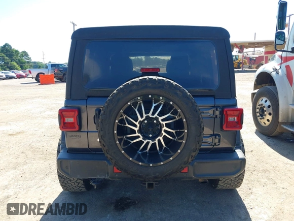 2018 Jeep Wrangler Unlimited Sport S с VIN 1C4HJXDN6JW277829, выставлен на аукционе IAAI как лот 42607187 с пробегом 107 461 миль миль и . История ставок и продаж доступна на DreamBid. Изображение 16.
