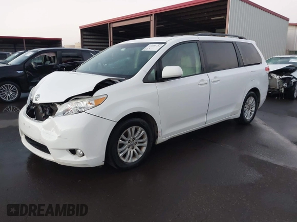 2014 Toyota Sienna XLE with VIN 5TDYK3DC1ES429932, listed as a IAAI auction lot 41692134 with 93,625 mi miles. Bid and sale history available at carsss.com. Image 2.