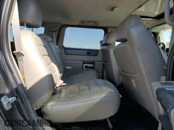 2004 Hummer H2 with VIN 5GRGN23U24H104327, listed as a Copart auction lot 74150914 with 181,933 mi miles and Salvage Title. Bid and sale history available at carsss.com. Image 11.
