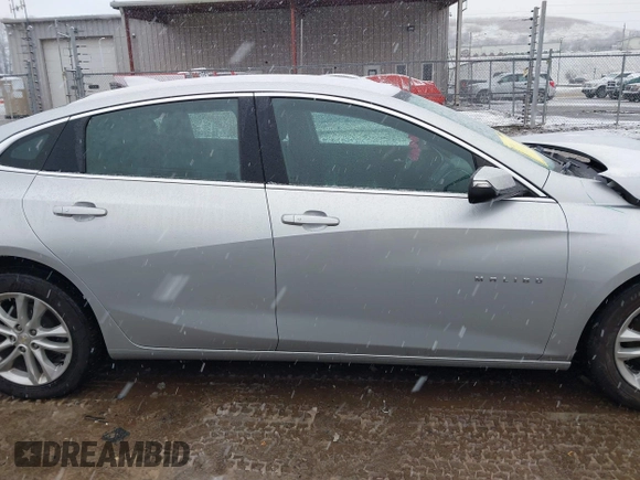 2018 Chevrolet Malibu LT z VIN 1G1ZD5STXJF269890, wystawiony jako IAAI lot #41504935 z przebiegiem 107 190 mil mil oraz . Historia ofert i sprzedaży dostępna na DreamBid. Obrazek 13.